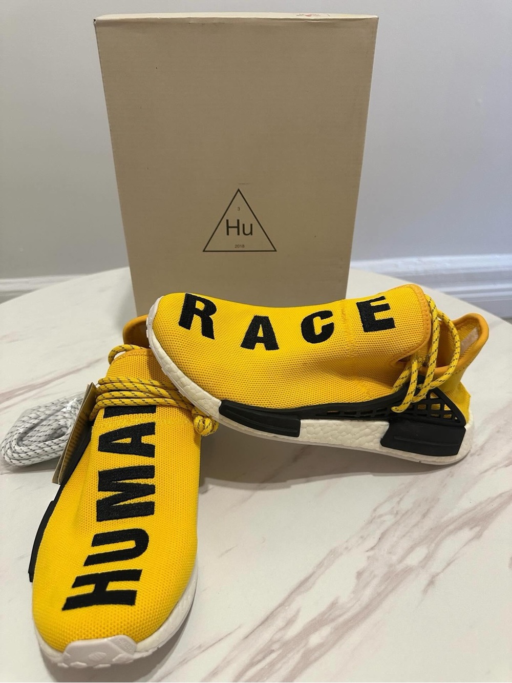 adidas Yellow 'Human Race' Slip-On Sneakers with Black Accents